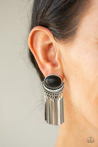 Paparazzi Monsoon Season - Black  -  A smooth black stone is pressed into the top of a silver studded half-moon frame. Flat silver rods swing from the bottom of the earthy frame, for a noise-making finish. Earring attaches to a standard post fitting.
