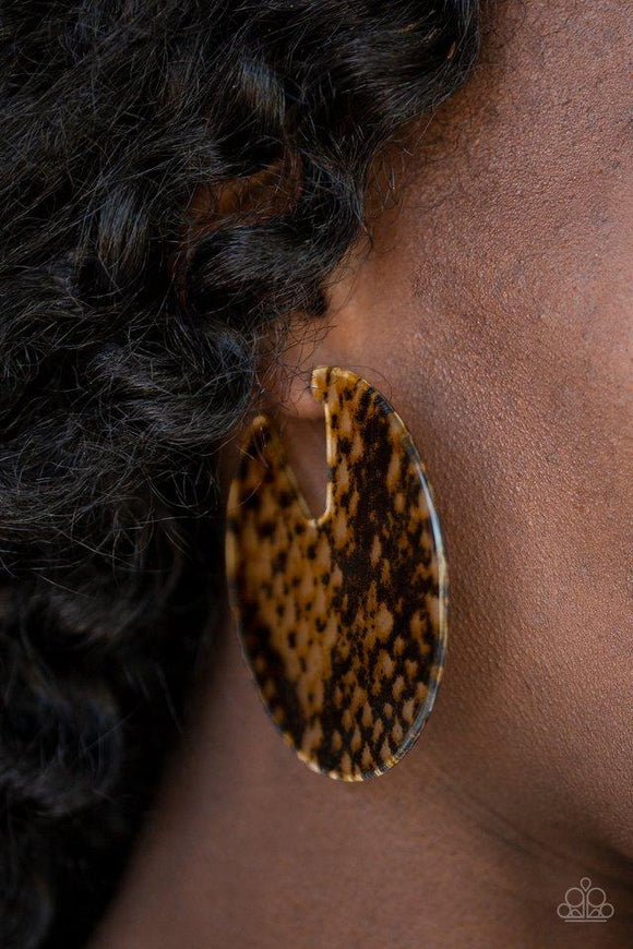 Paparazzi Hit Or HISS - Multi Featuring a tortoise shell-like pattern, an abstract acrylic hoop curls around the ear for a retro look. Earring attaches to a standard post fitting. Hoop measures approximately 2 3/4