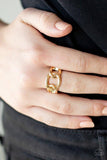 Paparazzi Well Connected - Gold  -  Glistening gold links connect across the finger, creating an edgy band. Features a dainty stretchy band for a flexible fit.
