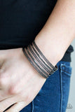 Paparazzi Stack Shack - Black Featuring smooth and diamond-cut finishes, a variation of shimmery gunmetal bars stack across the wrist, coalescing into a casual cuff.
