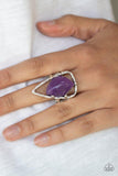 Paparazzi Get The Point - Purple
An abstract purple stone is nestled inside a hammered silver triangle, creating an artisan inspired frame atop the finger. Features a stretchy band for a flexible fit.
 