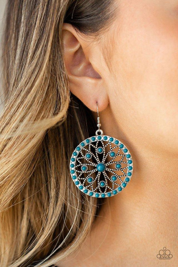 Paparazzi Merry Mandalas - Blue Dainty blue beads are sprinkled along a shimmery silver frame swirling with floral filled filigree, creating a whimsical mandala-like frame. Earring attaches to a standard fishhook fitting.
