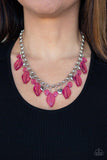 Paparazzi Malibu Ice - Pink A collection of glassy pink beads and shimmery silver accents dangle from the bottom of a glistening silver chain, creating a flirtatious fringe below the collar. Features an adjustable clasp closure.
