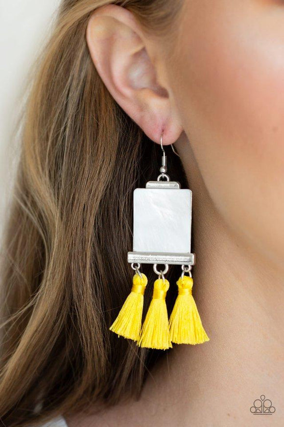 Paparazzi Tassel Retreat - Yellow A rectangular shell-like accent is nestled into a shiny silver frame. A trio of shiny yellow threaded tassels swing from the bottom of the incandescent frame for a flirtatious finish. Earring attaches to a standard fishhook fitting.

