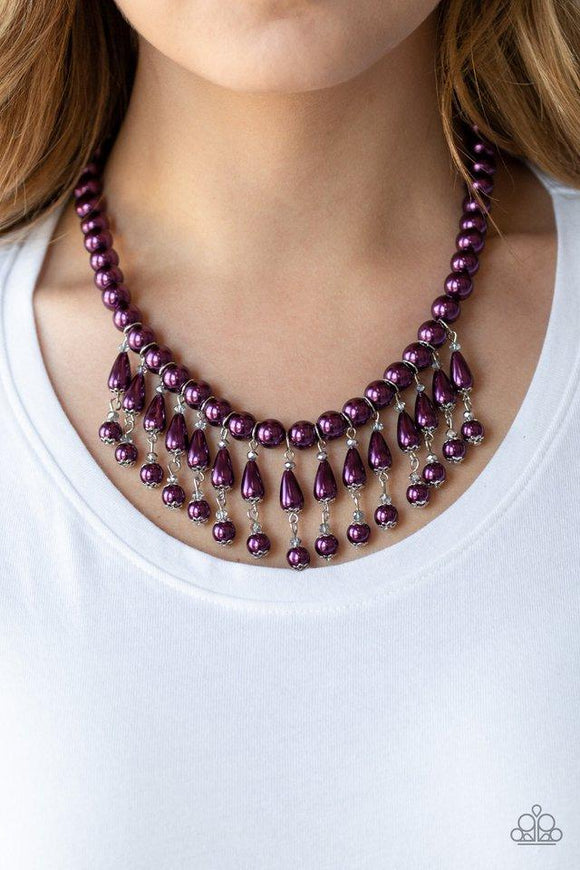 Paparazzi Miss Majestic - Purple Pearly purple teardrop beads link with classic purple pearls as they drip from a timeless strand of purple pearls. Sprinkled with dainty crystal-like accents, the refined fringe cascades below the collar for a glamorous finish. Features an adjustable clasp closure.
