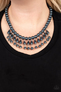 Paparazzi Miss Majestic - Blue - Necklace  -  Pearly blue teardrop beads link with classic blue pearls as they drip from a timeless strand of blue pearls. Sprinkled with dainty crystal-like accents, the refined fringe cascades below the collar for a glamorous finish. Features an adjustable clasp closure.
