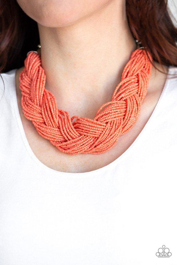 Paparazzi The Great Outback - Orange  -  Brushed in a refreshing coral hue, countless seed beads weave into an indigenous braid below the collar. The colorful strands attach to large silver beads, adding a hint of metallic shimmer to the playful design. Features an adjustable clasp closure.
