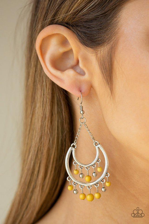 Paparazzi Free-Spirited Spirit - Yellow  -  Dainty yellow and silver beads swing from the top and bottom of a shimmery silver half-moon frame, creating a vivacious fringe. Earring attaches to a standard fishhook fitting.
