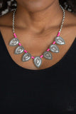 Paparazzi Terra Trailblazer - Pink A collection of dainty pink stone beads and ornate silver teardrop frames are threaded along an invisible wire below the collar for a fierce tribal look. Features an adjustable clasp closure.
