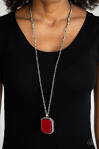 Paparazzi Let Your HEIR Down - Red  -  Bordered in dainty hematite rhinestones, an oversized faceted red emerald style gem swings from the bottom of an antiqued silver wheat chain for a blinding look. Features an adjustable clasp closure.
