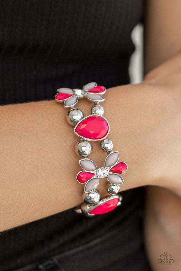 Paparazzi Fabulously Flourishing - Pink - Bracelet  -  Featuring pink and Paloma beaded petals, white rhinestone dotted floral frames, shiny silver beads, and faceted pink teardrop beads are threaded along stretchy bands around the wrist for a glamorous look.
