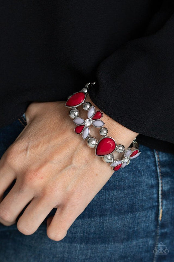 Paparazzi Fabulously Flourishing - Red - Bracelet  -  Featuring wine and Paloma beaded petals, white rhinestone dotted floral frames, shiny silver beads, and faceted wine teardrop beads are threaded along stretchy bands around the wrist for a glamorous look.
