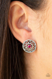 Paparazzi Sunlit Splendor - Pink  -  A dainty pink rhinestone dots the center of a shiny silver frame radiating with a glistening sunburst pattern for a whimsical look. Earring attaches to a standard post fitting.
