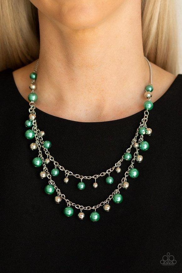 Paparazzi Fantastic Flair - Green A refined collection of glistening silver and pearly green beads swing from the bottom of shimmery silver chains, creating glamorous layers below the collar. Features an adjustable clasp closure.
