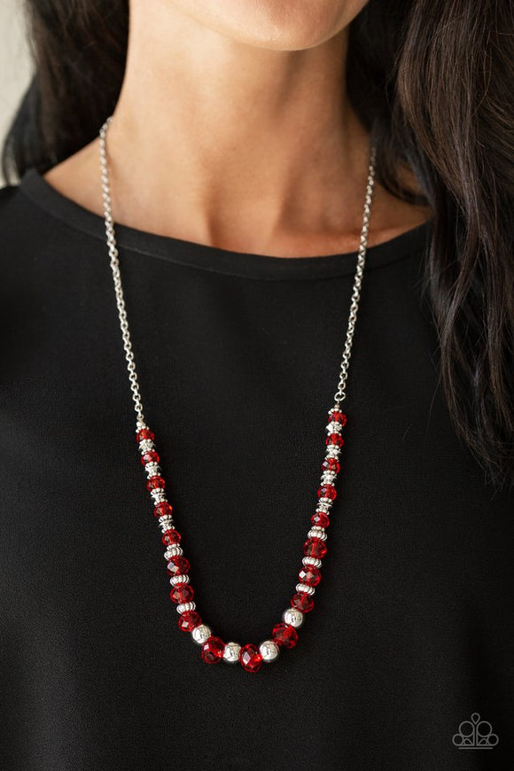Paparazzi Stratosphere Sparkle - Red - Necklace  -  Varying in size, shiny silver beads, textured silver accents, and red crystal-like beads are threaded along an invisible wire at the bottom of a lengthened silver chain for a refined flair. Features an adjustable clasp closure.
