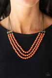 Paparazzi Terra Trails - Orange - Necklace  -  Strands of refreshing orange stones and textured brass accents are threaded along invisible wires streaming from the bottom of dainty brass chains, creating earthy layers below the collar. Features an adjustable clasp closure.
