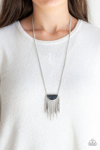 Paparazzi Desert Hustle - Black Chiseled into a half-moon shape, a black stone pendant swings from the bottom of a lengthened silver chain. Flared silver rods and shimmery silver chains stream from the bottom of the pendant for a seasonal finish. Features an adjustable clasp closure.
