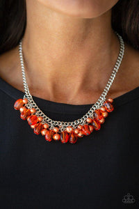 Paparazzi 5th Avenue Flirtation - Orange A collection of glassy and pearly orange beads dangle from the bottom of interconnected silver chains, creating a flirtatious fringe below the collar. Features an adjustable clasp closure.
