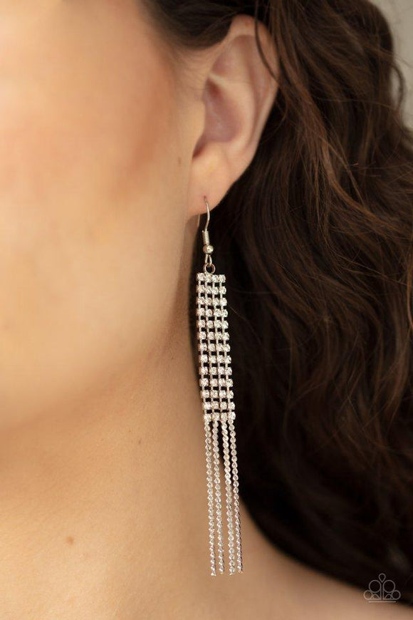 Paparazzi Rhinestone Romance - White  -  Strands of glittery white rhinestones gradually fade into ornate silver chains, creating a glamorous chandelier. Earring attaches to a standard fishhook fitting.

