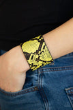 Paparazzi The Rest Is HISS-tory - Yellow  -  Featuring vibrant yellow and black python print, a thick black leather band wraps around the wrist for a wild fashion. Features an adjustable snap closure.
