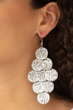 Paparazzi Uptown Edge - Silver  -  Embossed in rippling texture, a glistening collection of silver discs cascade from the ear for an edgy look. Earring attaches to a standard fishhook fitting.
