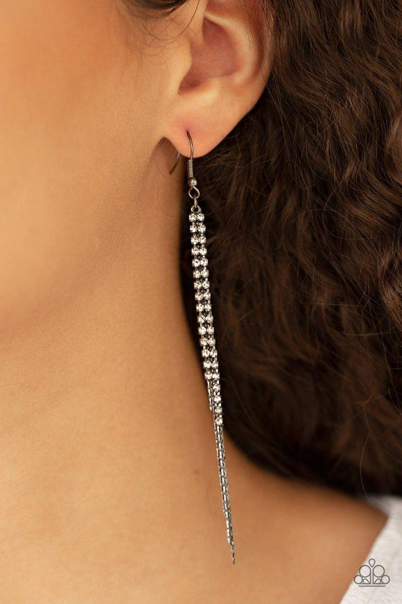 Paparazzi REIGN Check - Black  -  Strands of glittery white rhinestones and dainty gunmetal chains stream from the ear, coalescing into a refined tassel. Earring attaches to a standard fishhook fitting.
