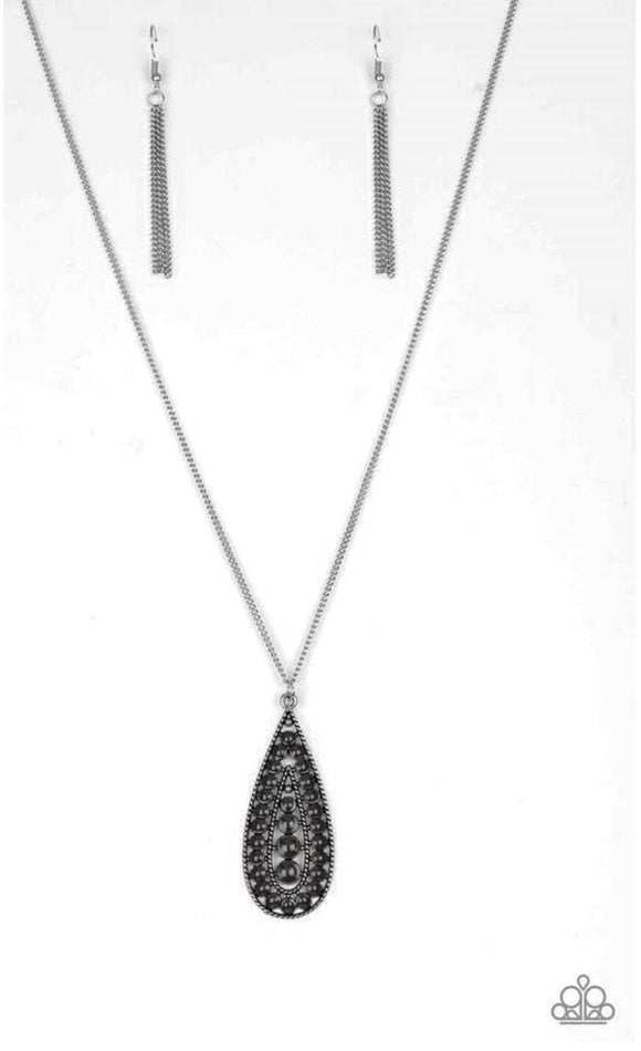 Paparazzi Tiki Tease- Black Brushed in a black finish, bubbly silver teardrop swings from the bottom of an elongated silver chain for a tribal-inspired look. Features an adjustable clasp closure.


