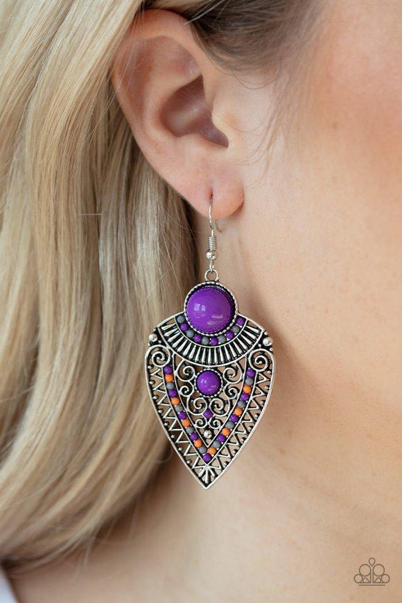 Paparazzi Tribal Territory - Purple  -  Purple, orange, and gray beads decorate the front of a spade shaped silver frame radiating with linear and zigzagging details for a tribal inspired look. Earring attaches to a standard fishhook fitting.
