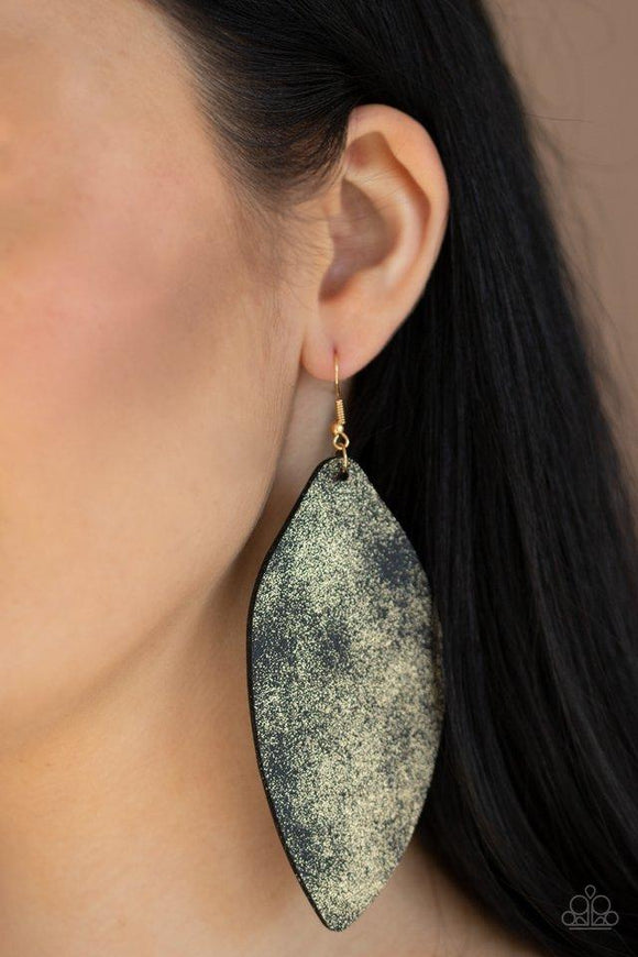 Paparazzi Serenely Smattered - Gold  -  Dusted in a golden shimmer, an asymmetrical piece of black leather swings from the ear in a statement-making fashion. Earring attaches to a standard fishhook fitting.
