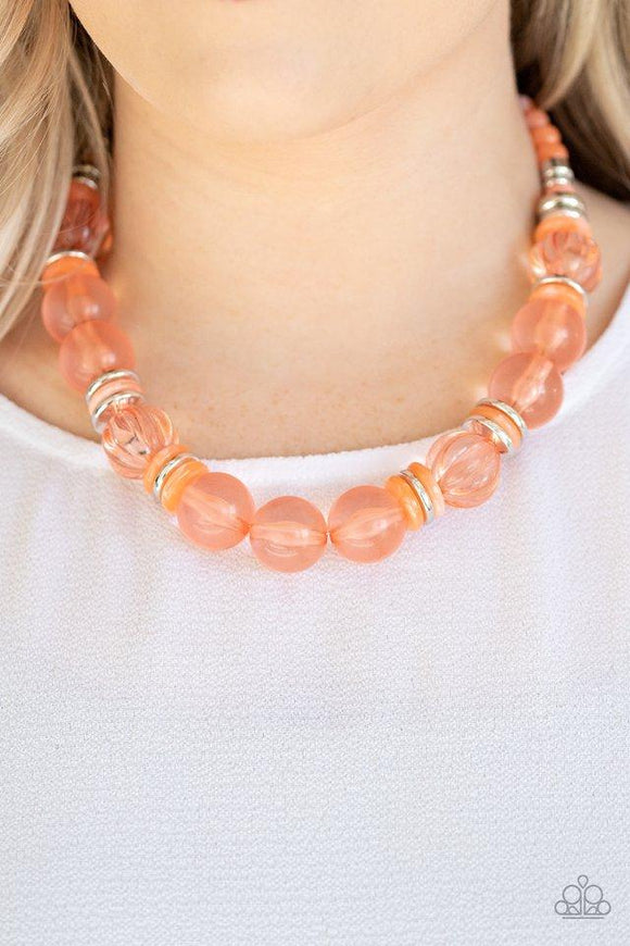 Paparazzi Bubbly Beauty - Orange  -  Featuring dainty silver and orange acrylic discs, a collection of oversized glassy orange beads are threaded along an invisible wire below the collar for a colorfully bubbly look. Features an adjustable clasp closure.
