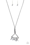 Paparazzi Raw Talent - Silver - Necklace  -  A raw collection of hematite crystal-like gemstones are threaded along the bottom of a silver triangular frame at the bottom of a knotted piece of gray cording for a seasonal flair. Features an adjustable clasp closure.
