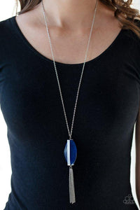 Paparazzi Tranquility Trend - Blue  -  Threaded through a rod, a refreshing blue stone sits inside a rectangular silver fitting, giving way to a shimmery silver chain tassel for a tranquil finish. Features an adjustable clasp closure.
