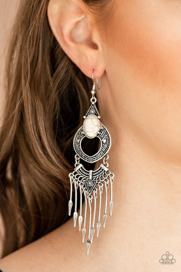 Paparazzi Southern Spearhead - White - Earrings  -  Spear-shaped silver bars dangle from the bottom of an ornately stacked white stone encrusted frame, creating a tapered fringe. Earring attaches to a standard fishhook fitting.
