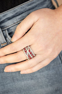 Paparazzi Elegant Effervescence - Red - Ring  -  A collection of fiery red and glassy white rhinestones scatter across the finger, layering into a refined stacked centerpiece. Features a stretchy band for a flexible fit.
