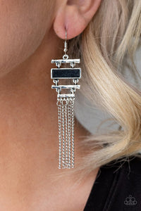 Paparazzi Stone Dwellings - Black - Earrings  -  Infused with a flat black stone frame, hammered silver bars stack into an abstract lure. Shimmery silver chains stream from the bottom, creating a whimsical fringe. Earring attaches to a standard fishhook fitting.
