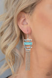 Paparazzi Stone Dwellings - Blue - Earrings  -  Infused with a flat turquoise stone frame, hammered silver bars stack into an abstract lure. Shimmery silver chains stream from the bottom, creating a whimsical fringe. Earring attaches to a standard fishhook fitting.
