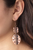 Paparazzi Lure Allure - Copper - Earrings  -  Brushed in an antiqued shimmer, a hammered square and oval copper frame have been threaded along a dainty rod, creating a handcrafted lure. Earring attaches to a standard fishhook fitting.
