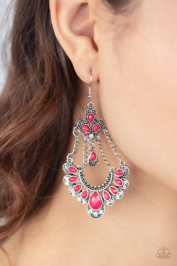 Paparazzi Unique Chic - Pink  -  Suspended by silver chains, faceted pink teardrop beads are pressed into decorative silver frames featuring silver filigree and glassy white rhinestones. The ornate frames coalesce into a whimsical frame. Earring attaches to a standard fishhook fitting.
