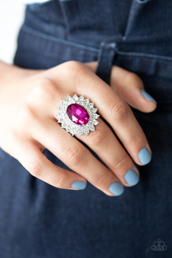 Paparazzi Secret Garden Glow - Pink - Ring  -  Dotted in dainty white rhinestones, glittery silver petals bloom from a faceted pink gem center, creating a refined centerpiece atop the finger. Features a stretchy band for a flexible fit.
