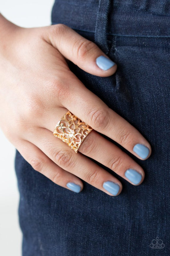 Paparazzi Guru Garden - Gold - Ring  -  Shiny gold bars delicately bloom across the finger, coalescing into an airy floral pattern around the finger for a whimsical look. Features a stretchy band for a flexible fit.
