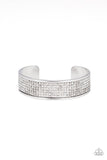 Paparazzi Cant Believe Your ICE - Silver - Bracelet  -  Row after row of smoky rhinestones are encrusted along the front of a thick silver cuff, creating a blinding statement piece around the wrist.

