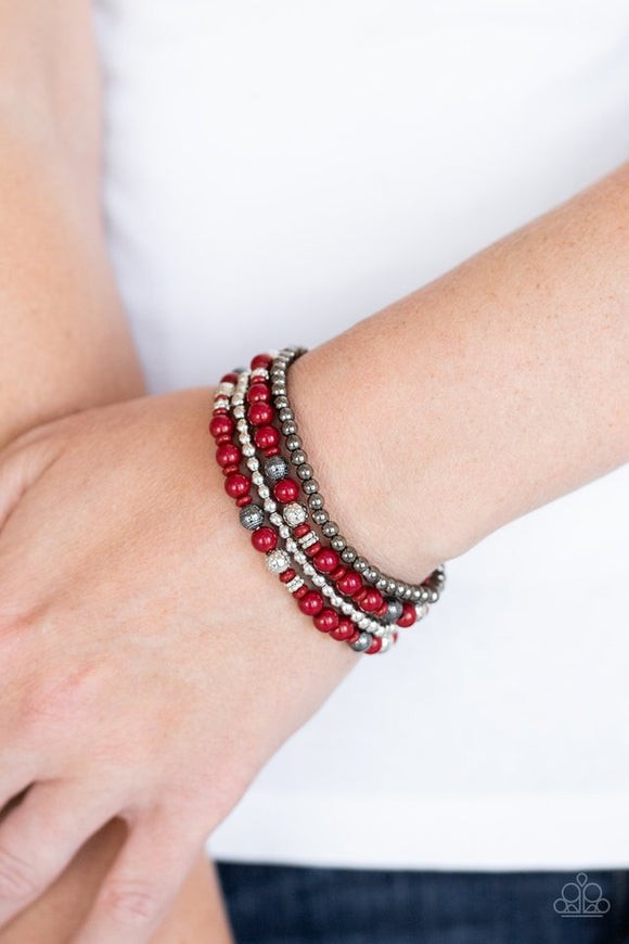 Paparazzi Stacked Style Maker - Red - Bracelet  -  Varying in size and texture, a mismatched collection of Fired Brick, gunmetal, and silver beads are threaded along stretchy bands around the wrist, creating colorful layers.
