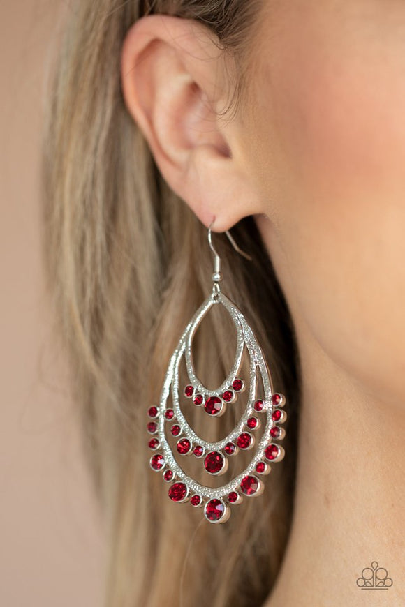 Paparazzi Break Out In TIERS - Red - Earrings  -  A gorgeous collection of fiery red rhinestones drip from the bottom of a tiered silver frame, coalescing into a dazzling statement piece. Earring attaches to a standard fishhook fitting.

