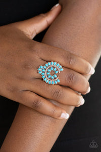 Paparazzi Trendy Talisman - Copper - Ring  -  Dainty turquoise teardrop stones are pressed into a studded copper frame, creating a whimsical squash blossom centerpiece atop the finger. Features a stretchy band for a flexible fit.
