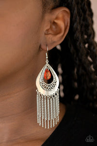 Paparazzi Scattered Storms - Red - Earrings  -  A faceted red teardrop dangles from the top of a decorative silver teardrop frame featuring stenciled and hammered details. Dainty silver chains stream from the bottom, adding a classic fringe to the refined display. Earring attaches to a standard fishhook fitting.
