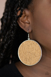 Paparazzi Wonderfully Woven - Brown - Earrings  -  Brown twine-like cording weaves across the front of an oversized silver disc for an earthy flair. Earring attaches to a standard fishhook fitting.
