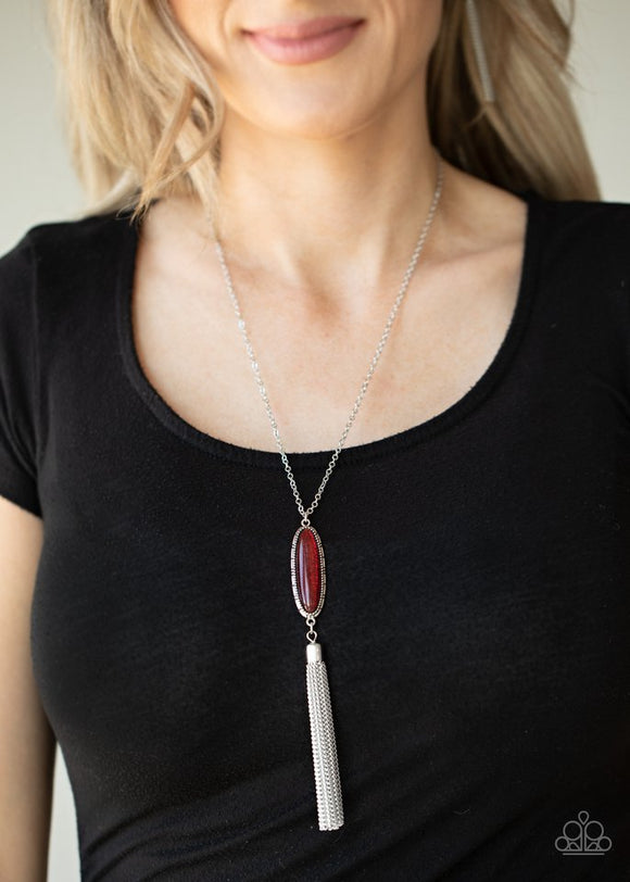 Paparazzi Stay Cool - Red - Necklace  -  A shimmery silver tassel streams from the bottom of a glittery red beaded pendant, creating a dazzling look at the bottom of a lengthened silver chain. Features an adjustable clasp closure.
