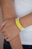 Paparazzi Hot Cross BUNGEE - Yellow - Bracelet  -  Infused with metallic frames, rows of white and yellow twine-like cording knot into an earthy display around the wrist. Features an adjustable sliding knot closure.
