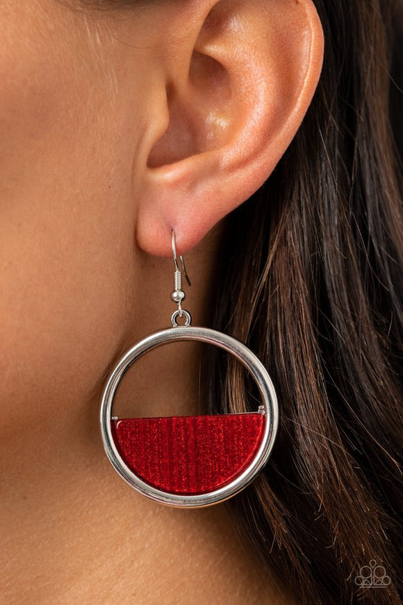 Paparazzi Stuck in Retrograde - Red - Earrings  -  A glittering Samba acrylic crescent frame is nestled on the bottom of a shimmery silver hoop, coalescing into a colorfully retro frame. Earring attaches to a standard fishhook fitting.
