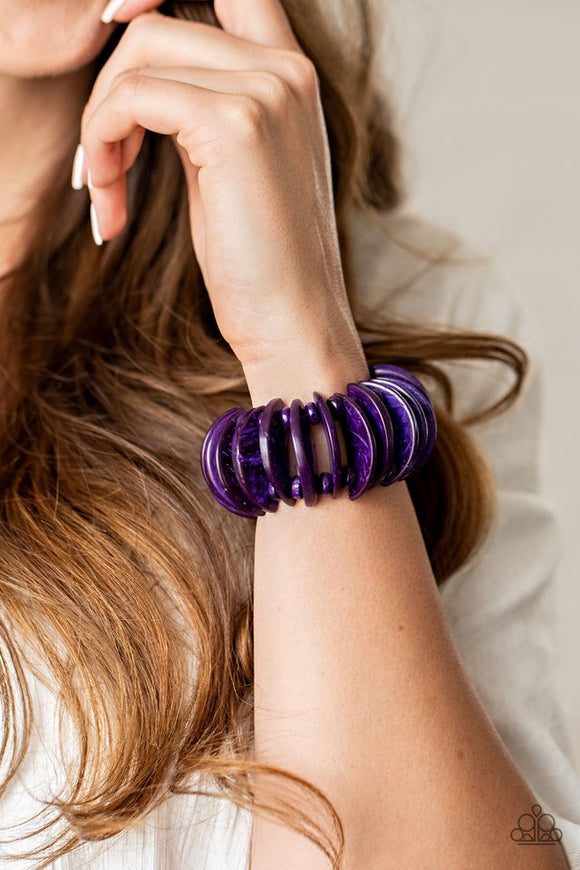 Paparazzi Tropical Tiki Bar - Purple - Bracelet  -  Infused with purple wooden beads, distressed purple wooden crescents are threaded along stretchy bands around the wrist for a summery look.

